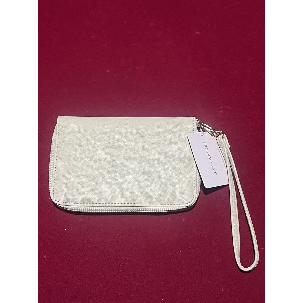 Lost + Wander White leather wristlet wallet with zipper closure and wrist strap